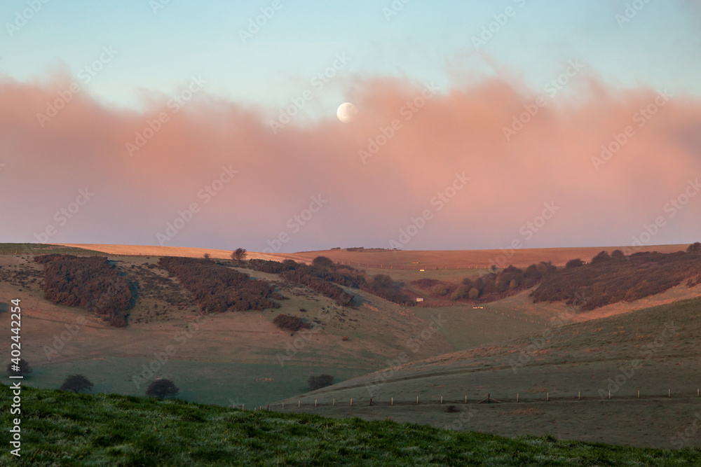 A Full Moon over the South Downs at Dawn