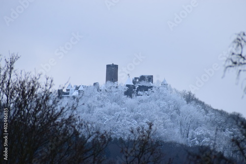 Nürburg im verschneiten weißen Wald photo