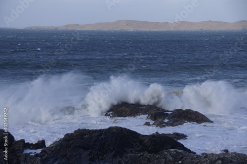 Storm waves breaking on rocks