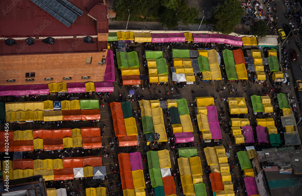 Colorful tents of open air bazaar flea market fair Mercado de las
