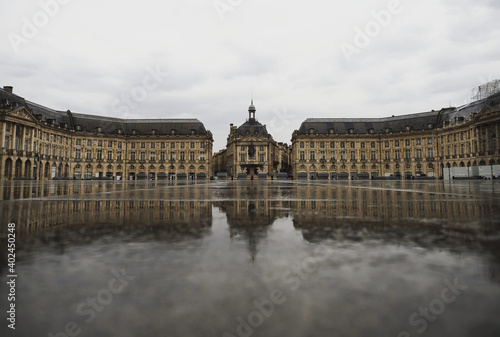 Miroir deau reflecting water fountain pool on Place de la bourse square in Bordeaux Gironde Nouvelle-Aquitaine France photo