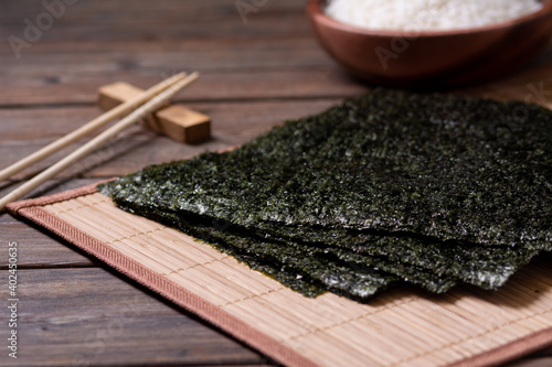 Nori leaves. Crunchy dried seaweed. Japanese traditional cuisine	