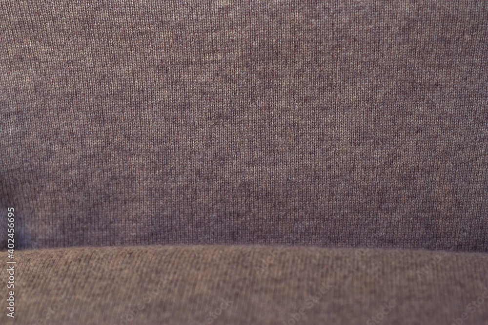 Fototapeta premium warm wool textile background - close up, with place for stnding, winter warm clothes and cute natural home decoration