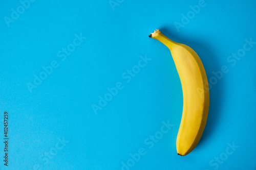 banana on bright blue background. Healthy eating. Vegan. Fruits. Diet