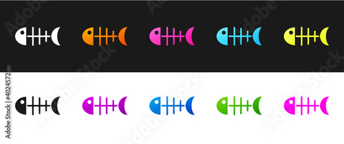 Set Fish skeleton icon isolated on black and white background. Fish bone sign. Vector.