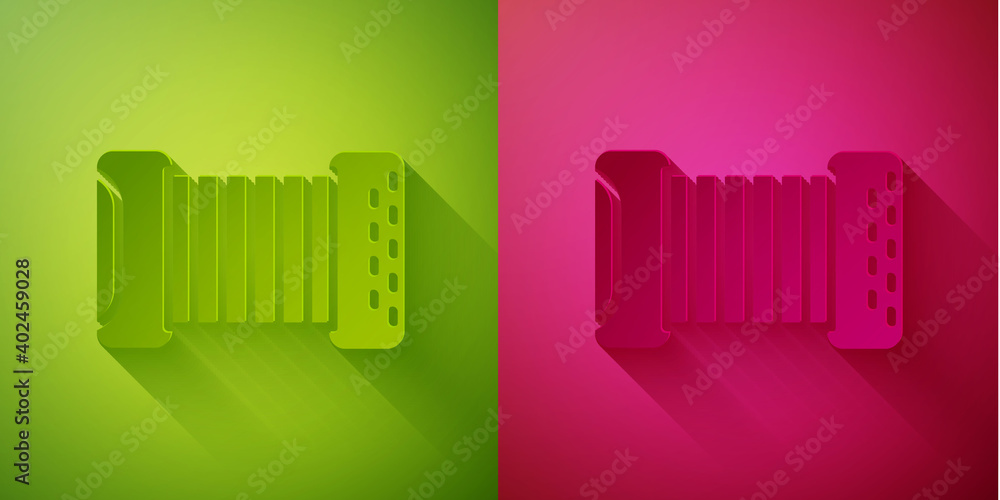 Paper cut Musical instrument accordion icon isolated on green and pink background. Classical bayan, harmonic. Paper art style. Vector.