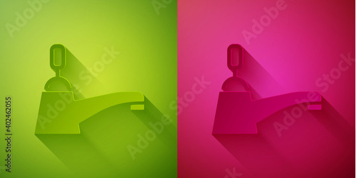 Paper cut Water tap icon isolated on green and pink background. Paper art style. Vector.