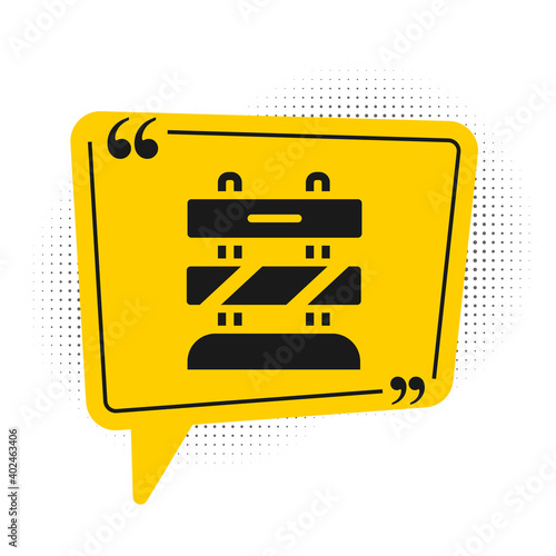 Black End of railway tracks icon isolated on white background. Stop sign. Railroad buffer end to destination. Yellow speech bubble symbol. Vector.