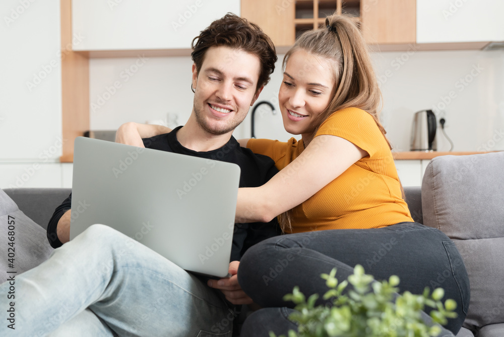 Couple using home internet with mobile devices Couple using home internet with mobile devices