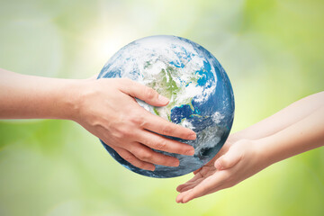 Earth globe in hands. World environment day