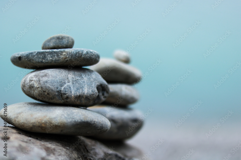 Balance stone on lake coast. Symbol of relax Balance stone on lake coast. Symbol of relax