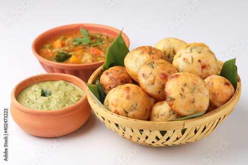 Kuzhi Paniyaram served with coconut chutney and sambar- South Indian breakfast