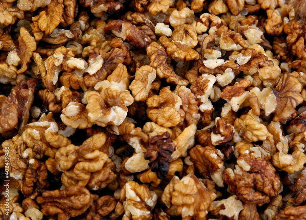 walnut nuts and tasty grains close up walnut nuts and tasty grains close up