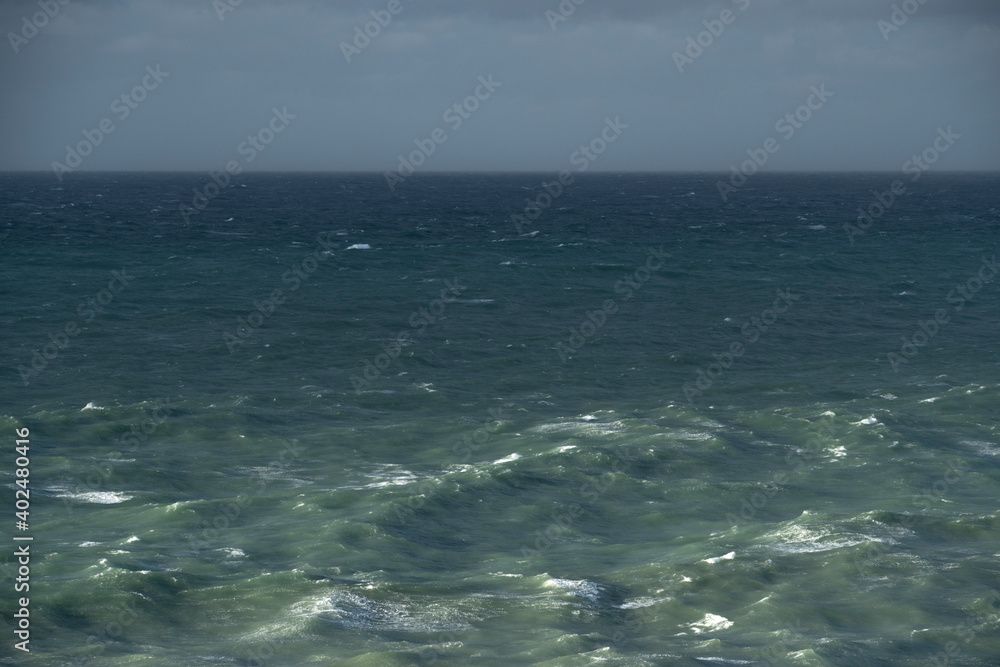 Blue sea in windy day