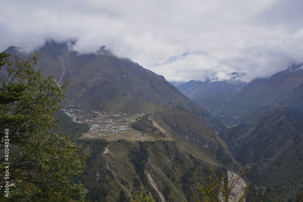 View on Phortse from Kyangjuma on the gokyo ri and Everest base camp trek. View on Phortse from Kyangjuma on the gokyo ri and Everest base camp trek.