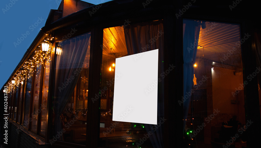 Obraz premium empty wooden table on blurred light gold bokeh of cafe restaurant on dark background, blurred cafe interior place for your products on the table