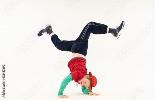 фотографія boy in difficult breakdance position, special boy, crazy kid, super kid, hip hop