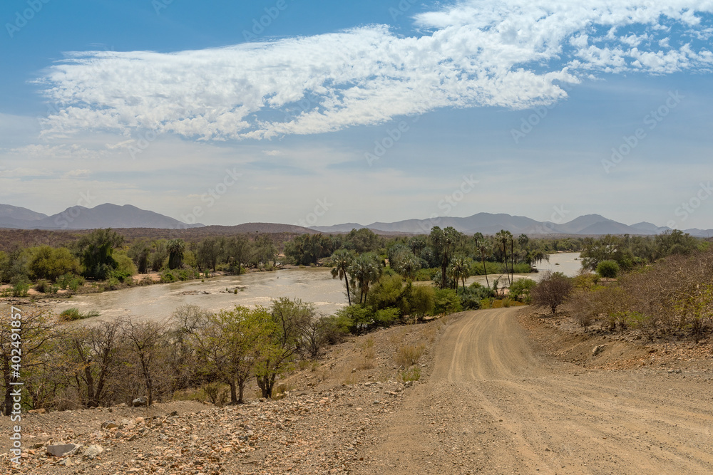 Landscape view of the Kunene River, the border river between Namibia and Angola
