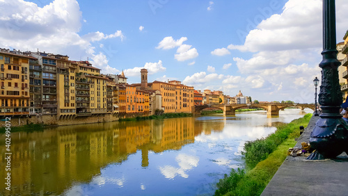 View from along the Arno river of the medieval, colorful city of Florence, Italy.
