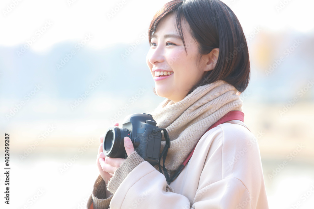 Fototapeta premium 写真を撮る女性