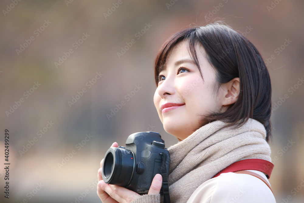 Fototapeta premium 写真を撮る女性