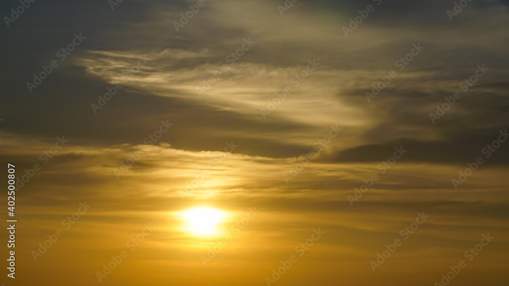 Sunset sky with clouds background