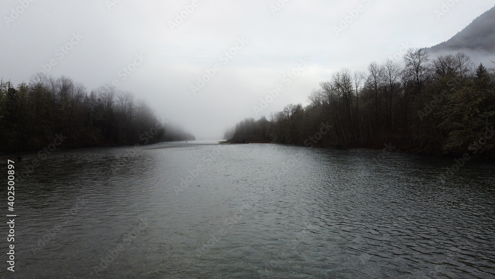 General view of the Skagit river on a cold, foggy winter day in the Pacific Northwest General view of the Skagit river on a cold, foggy winter day in the Pacific Northwest