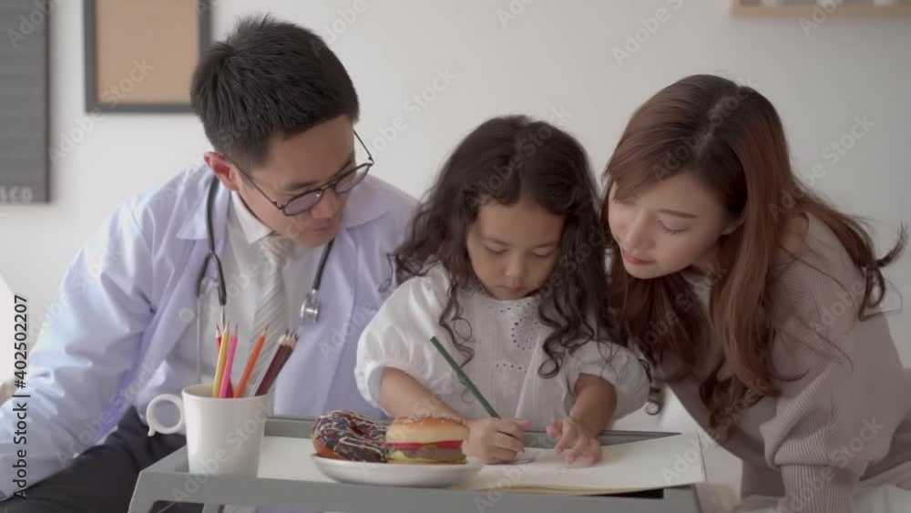 Children doctor taking care little young girl. Children doctor taking care little young girl.