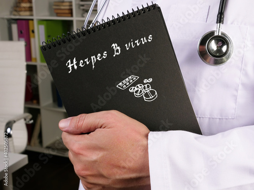 Medical concept meaning Herpes B virus with sign on the sheet.