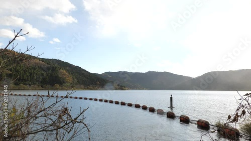 A view of Lake Yogo taken in autumn under a light rain. photo