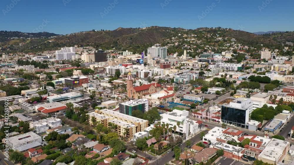 Low aerial and tilting up shot of downtown Hollywood. 4K Low aerial and tilting up shot of downtown Hollywood. 4K