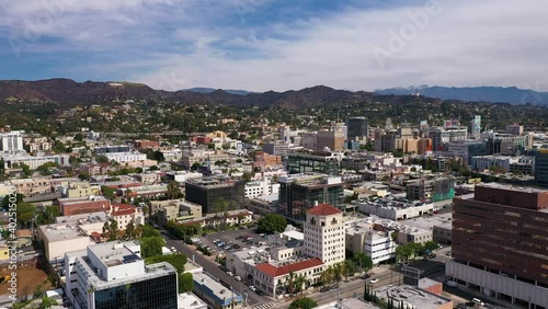 Wallpaper Mural Low aerial shot of downtown Hollywood with the Hollywood sign. 4K Torontodigital.ca
