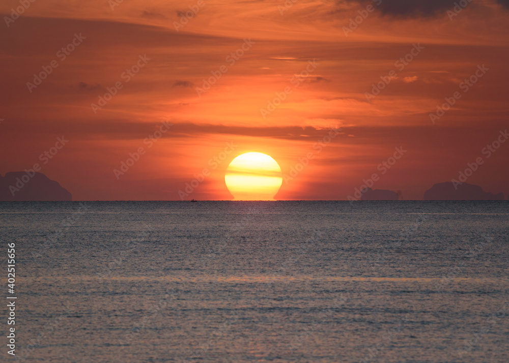 Scene of beautiful omega sunrise at Saphanhin , Phuket Scene of beautiful omega sunrise at Saphanhin , Phuket