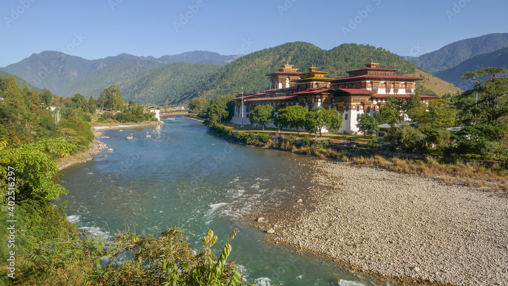 Magnificent panoramic view of Punakha dzong in Western Bhutan with Mo Chhu river and cantilever bridge
Magnificent panoramic view of Punakha dzong in Western Bhutan with Mo Chhu river and cantilever bridge