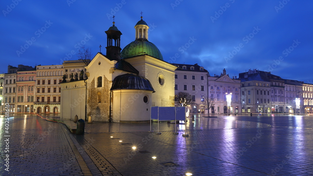 Saint Adalbert church on Main Market Square in Krakow, Poland, night cityscape of old town
