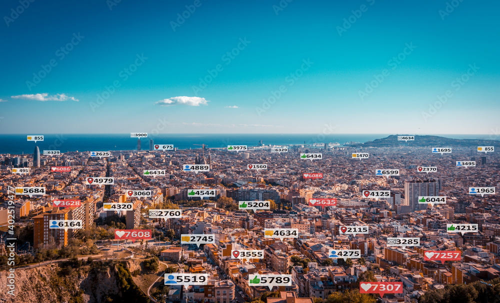 Social media and notification icons over a Barcelona aerial view, Spain.