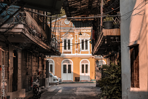 Deserted alleyway among the vintage house in Yaowarat Road or Chinatown in Bangkok Thailand 