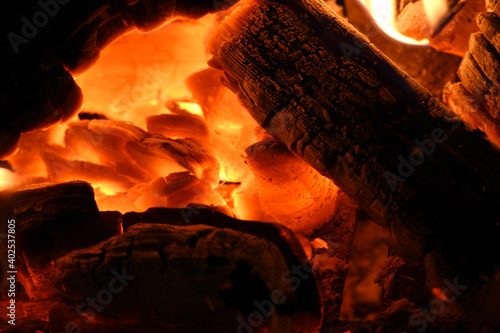 wood logs on fire in a fire place