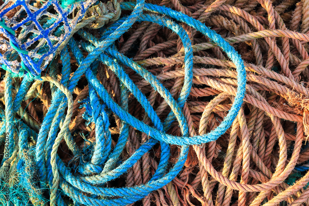 multiple old nautical ropes background used in fishing