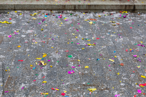 Colored garbage from fireworks on the ground after the holiday. photo