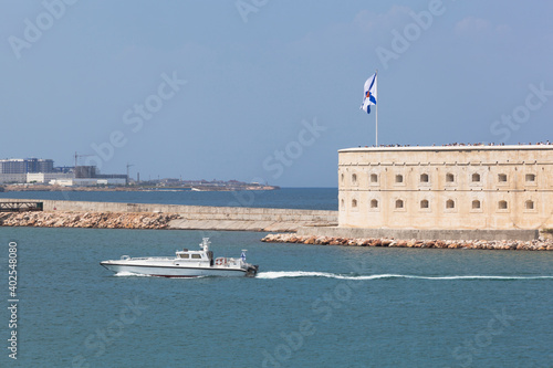 White boat on the background of the Konstantinovskaya battery on Navy Day in the hero city of Sevastopol, Crimea