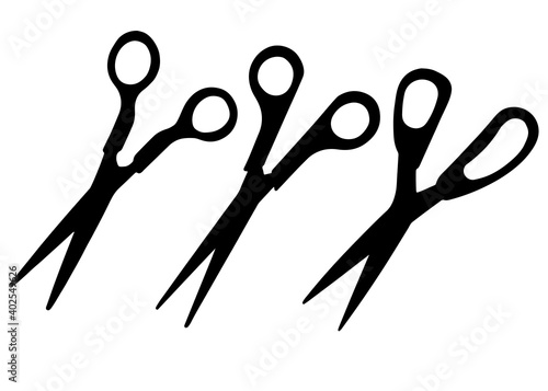 Scissors open for sewing clothes or haircuts in a set.
