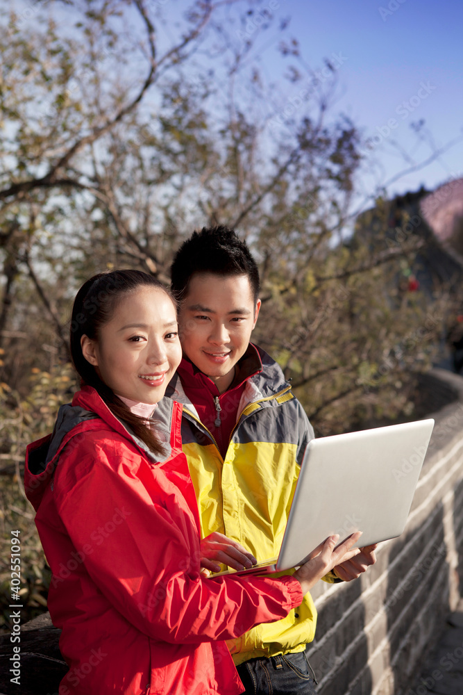 Young couples in the Great Wall tourism in computer Young couples in the Great Wall tourism in computer