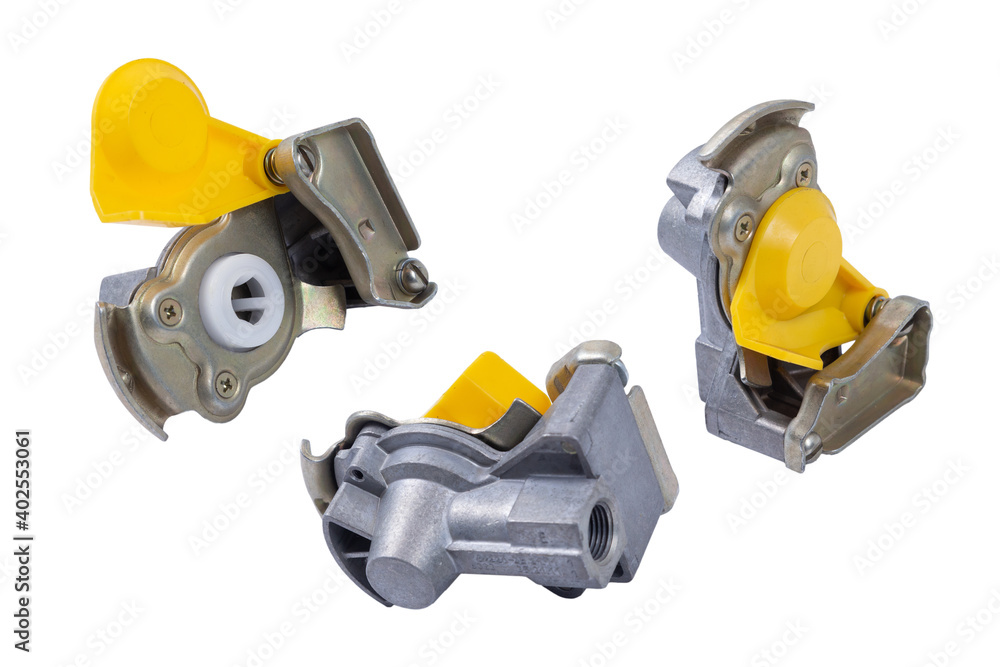 three pneumatic connection heads with valve on isolated white background. auto parts three pneumatic connection heads with valve on isolated white background. auto parts