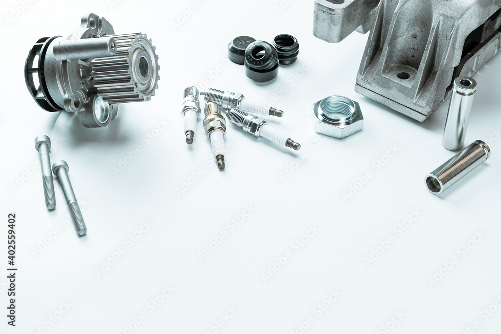 Car construct. Set of new metal car part. Auto motor mechanic spare or automotive piece isolated on white background. Technology of mechanical gear. Car construct. Set of new metal car part. Auto motor mechanic spare or automotive piece isolated on white background. Technology of mechanical gear.