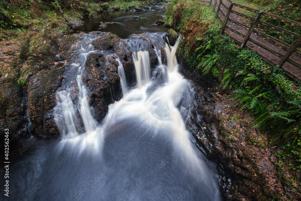 Fototapeta premium Waterfall at Glenariff Forest Park, Northern Ireland, UK