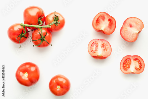 tomatoes on a white background, chopped tomatoes, tomatoes with a sprig