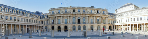 Tableau sur toile The square of the Palais Royal in Paris with the black and white columns