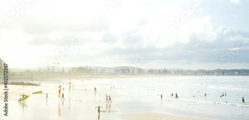 Kirra Beach scene busy with people on a perfect summers evening