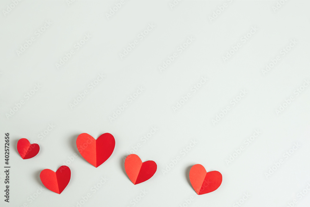 Composition with red paper hearts. Background with copy space for Valentine's Day.